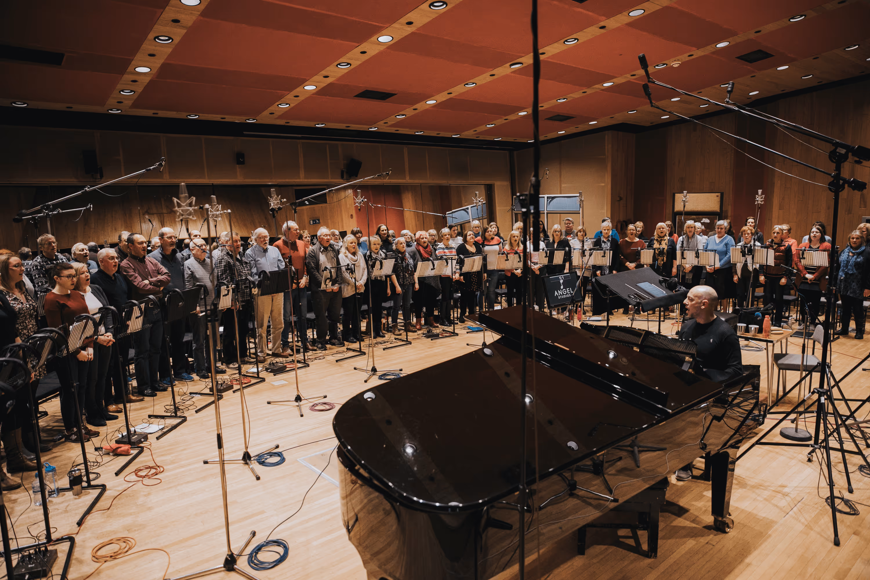 Next Stage Choir in a recording session