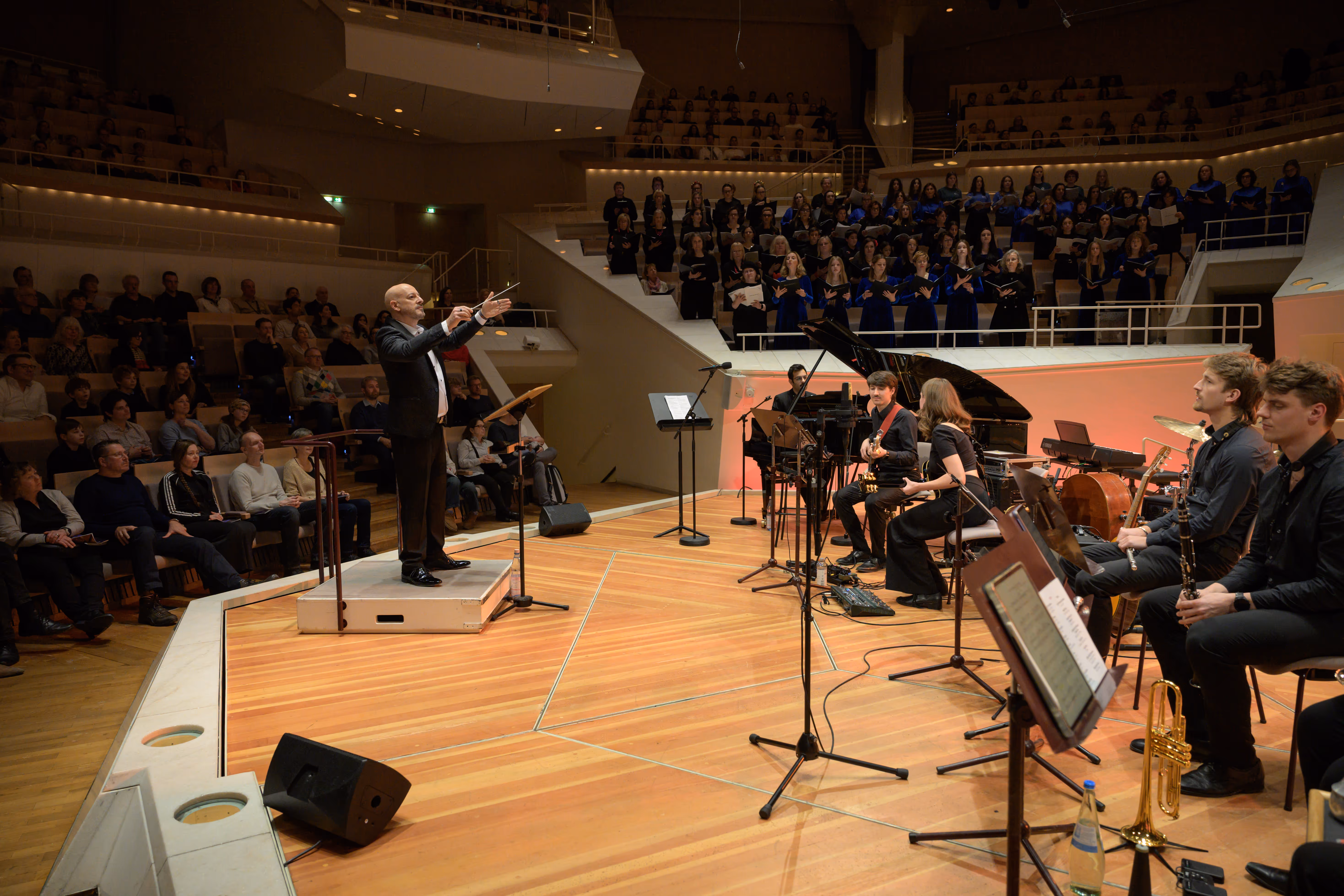Russell Scott conducting on an international stage
