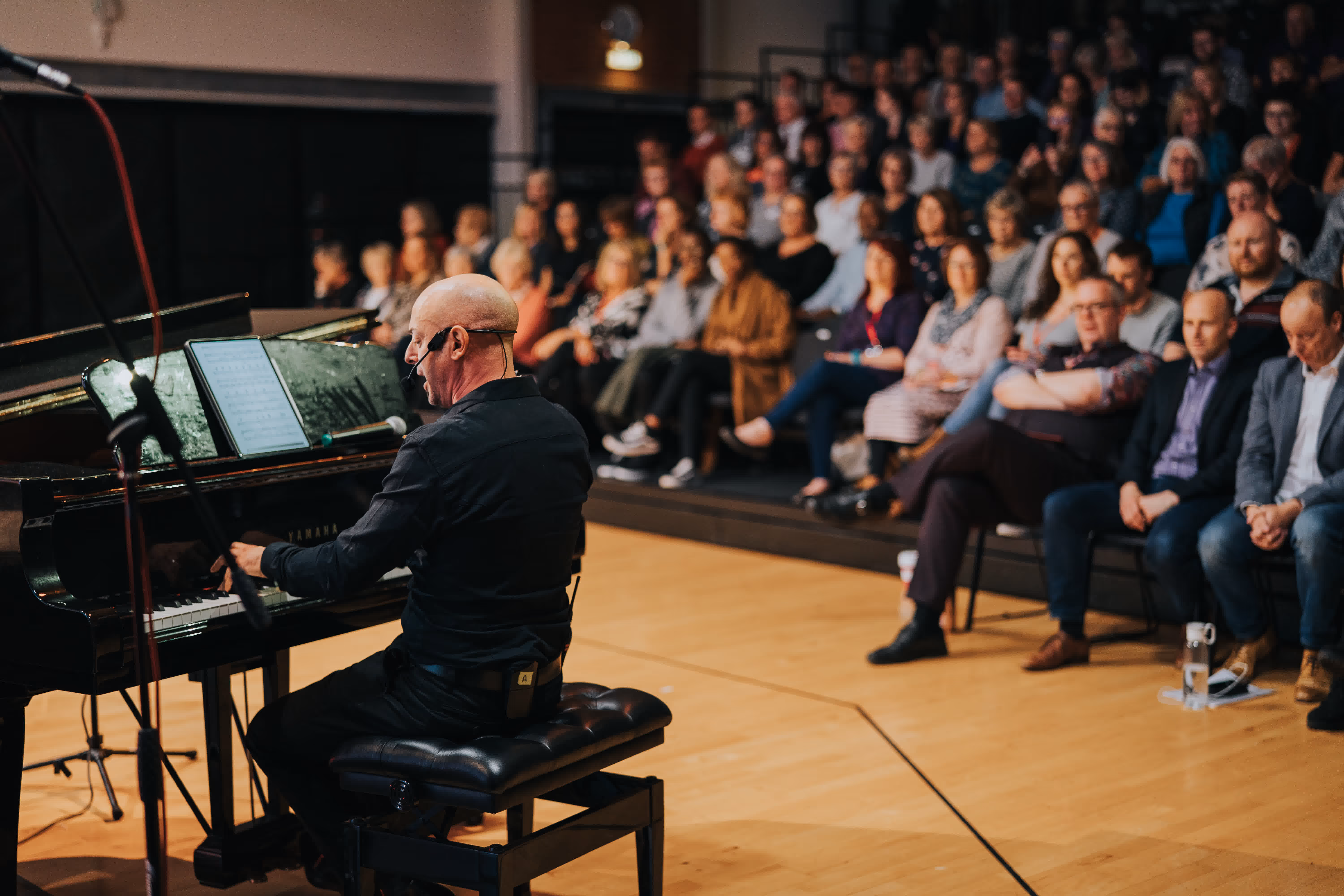 Russell Scott leading a choir workshop